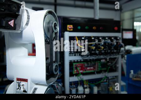 The circuit boards and sensors of a robotic hand are designed by a robotics engineer. in the Robotics Institute Research Center Stock Photo