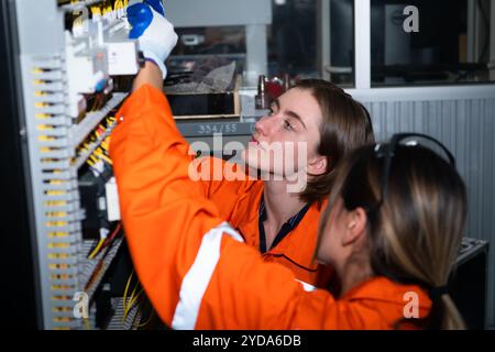 The circuit boards and sensors of a robotic hand are designed by a robotics engineer. in the Robotics Institute Research Center Stock Photo