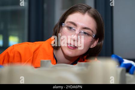 3D printer print job that the technician must examine the details of the work piece to match the design 100% Stock Photo