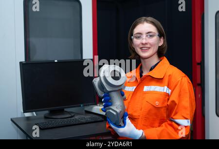 3D printer print job that the technician must examine the details of the work piece to match the design 100% Stock Photo