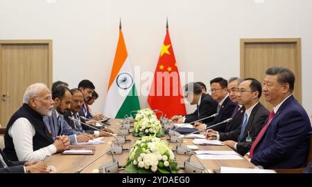 Kazan, Russia. 23 October, 2024. Indian Prime Minister Narendra Modi, left, remarks during a bilateral meeting with Chinese President Xi Jinping, right, on the sidelines of the 16th BRICS summit, October 23, 2024 in Kazan, Tatarstan, Russia.  Credit: PIB/Press Information Bureau/Alamy Live News Stock Photo