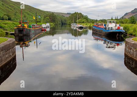 Boats moored at Laggan Locks on the Caledonian Canal Stock Photo