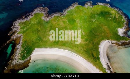 Aerial View of a Lush Green Island in Norway, Kolbeinsanden Beach, Lofoten Stock Photo