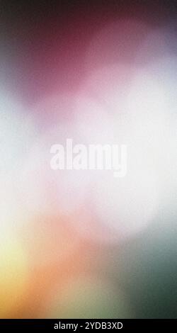 Abstract grainy gradient background fading from purple to green and white Stock Photo