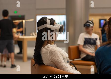 Customers are seen trying Apple Vision Pro at the Apple Jing'an, the newest Apple store in Shanghai, China, on Saturday, August 3, 2024. Stock Photo