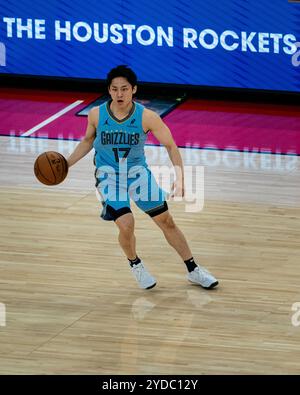 Houston, USA. 25th Oct, 2024. Kawamura Yuki of Memphis Grizzlies dribbles during the 2024-2025 NBA regular season match between Houston Rockets and Memphis Grizzlies in Houston, Texas, the United States, on Oct. 25, 2024. Credit: Chen Chen/Xinhua/Alamy Live News Stock Photo