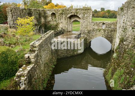 Ruins of The Medieval Barbican and Mill at Leeds castle under a grey sky. Stock Photo