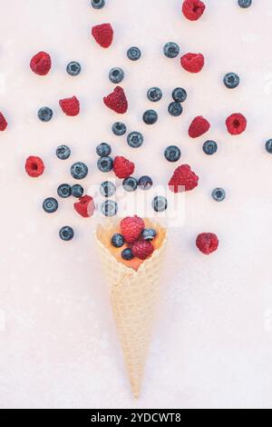Summer composition berries ice cream waffle cone Stock Photo