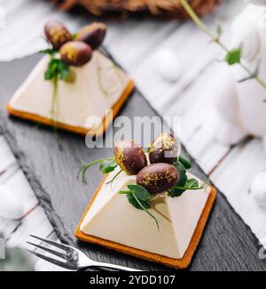 Dessert souffle cookies with chocolate Easter eggs Stock Photo