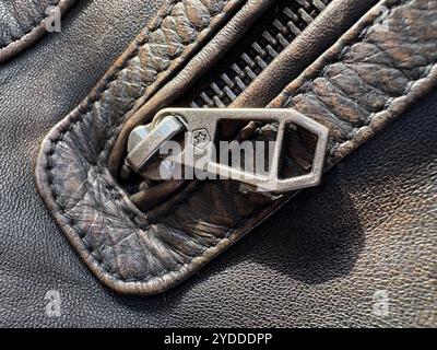 Detail of a sturdy zip on a quality leather bomber jacket Stock Photo
