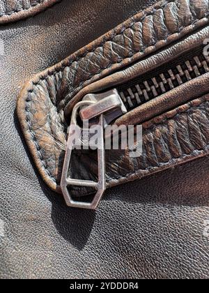 Detail of a sturdy zip on a quality leather bomber jacket Stock Photo