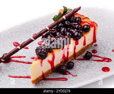 Classic New York style cheesecake with currant jam Stock Photo