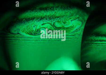 Green reflections, fluid abstraction, Natural background, minimalistic abstraction, minimalistic oil background, natural oil textur Stock Photo