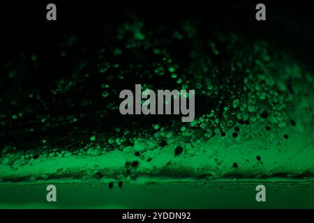 Green reflections, fluid abstraction, Natural background, minimalistic abstraction, minimalistic oil background, natural oil textur Stock Photo