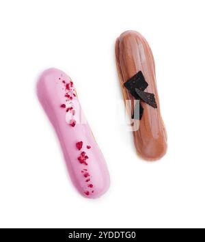 Chocolate and raspberry eclairs isolated on white background Stock Photo