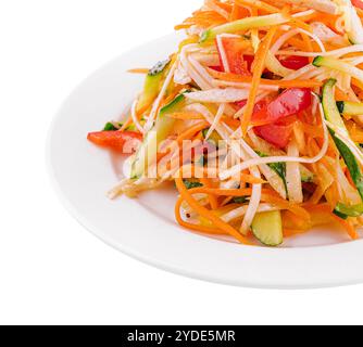 Salad of carrots, cucumbers and peppers on plate Stock Photo