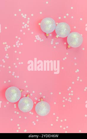 Christmas pink flat lay pattern with pearl balls Stock Photo