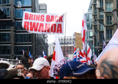 London, UK. 26th Oct 2024. Supporters of 'Tommy Robinson' assemble and march from near Victoria. Credit: Matthew Chattle/Alamy Live News Stock Photo