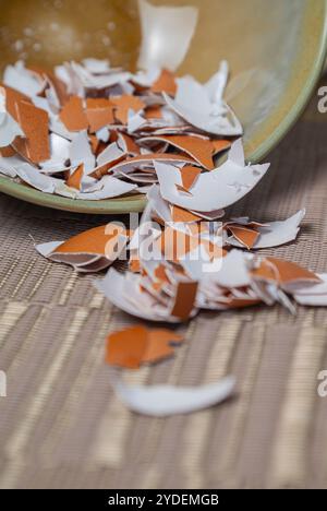 Broken egg shells ,Recycling kitchen waste, Crushed egg shells for the compost and garden. Stock Photo