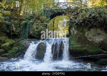 Scenic diversity of Mullerthal, Luxembourg's Little Switzerland, Schiessentumpel Cascade and river hiking routes, rock formations, forests, tourist de Stock Photo