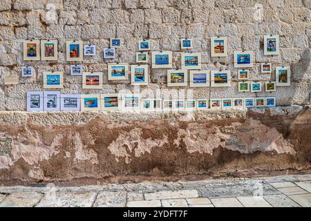 Small paintings displayed for sale, Split, Croatia Stock Photo