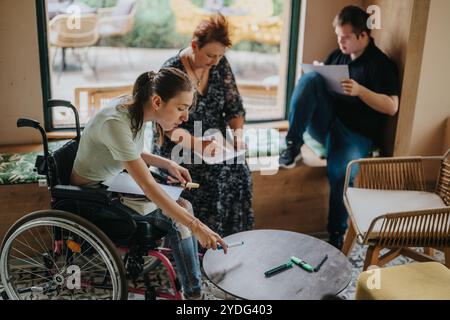 Inclusive group engaging in a collaborative work session indoors Stock Photo