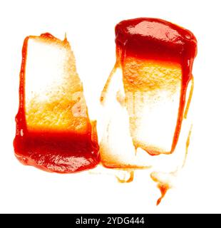 Ketchup or tomato puree splashes isolated on white background Stock Photo