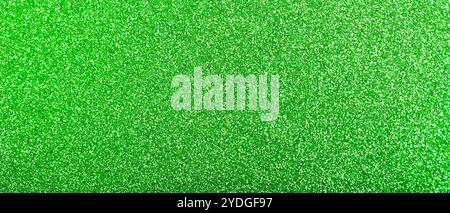 Abstract Green Background with Glitter and Sparkling Particles Stock Photo