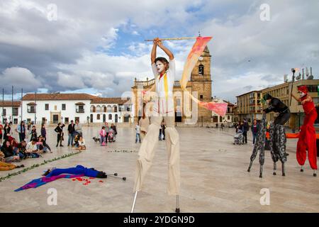 Theatre company 'Clepsidra' performing the dramatization of Oscar Wilde's tale 'the nightingale and the rose' on stilts in Colombia. Stock Photo