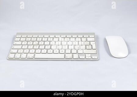 White wireless computer keyboard and mouse, isolated on white background Stock Photo