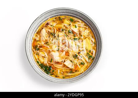 Homemade Chicken Noodle Soup isolated on white background, top view, design element. Bowl of hot chicken soup, healthy meal. Stock Photo