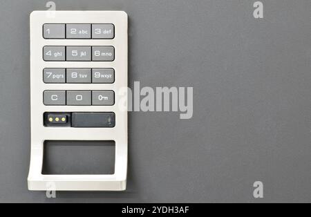 Digital combination number panel keypad safe locking mechanism security with copy space. Stock Photo