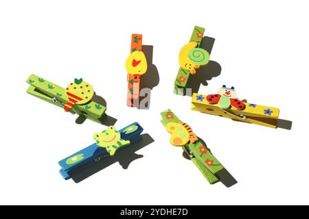 Wooden Pegs on White Background with Shadows Stock Photo