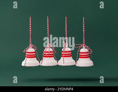 Trendy Christmas layout made with Xmas tree decorations on green background. Minimal creative Christmas and New Year concept. Stock Photo