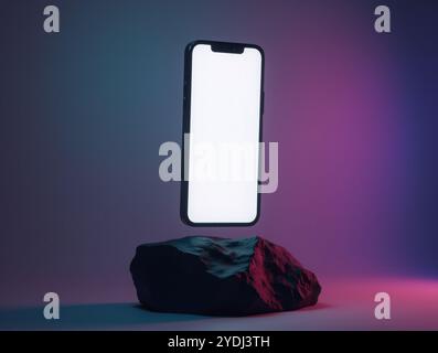 Front Side View of Floating iPhone 14 Pro Max with Empty White Screen on Geometric Black Rock Against Vibrant Gradient Background Stock Photo