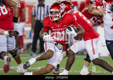 Houston, TX, USA. 26th Oct, 2024. Houston Cougars running back Stacy Sneed (21) carries the ball during a game between the Utah Utes and the Houston Cougars in Houston, TX. Trask Smith/CSM/Alamy Live News Stock Photo