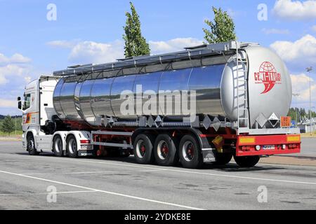 Truck and semi tank trailer parked on truck stop in summer. The ADR code 80-3264 signifies Corrrosive Liquid, Acidic, Inorganic. Forssa, FI. 17-6-18 Stock Photo