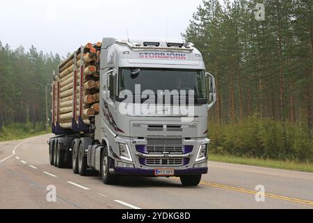 PETAJAVESI, FINLAND, SEPTEMBER 2, 2017: Volvo FH logging truck of SK Trans on the road on a foggy morning in early autumn Stock Photo