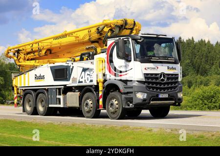 White Mercedes-Benz Arocs 3743 Putzmeister concrete pump truck of Betomik Oy at speed on Highway 2 in Forssa, Finland. July 17, 2020 Stock Photo