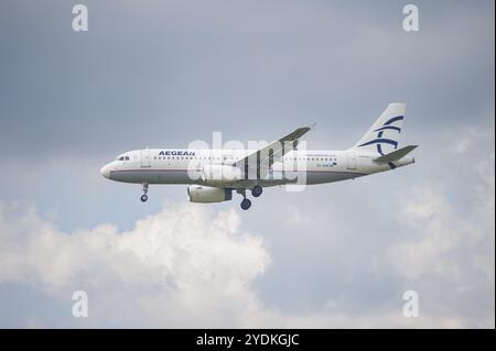 02.06.2024, Berlin, Germany, Europe, An Airbus A320-232 passenger aircraft of Aegean Airlines with the registration SX-DVK approaching Berlin Brandenb Stock Photo