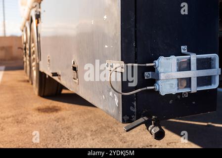 Security padlock with Atex regulations, with solar charging and GPS positioning, used, among others, in the transport of dangerous goods in tankers. Stock Photo