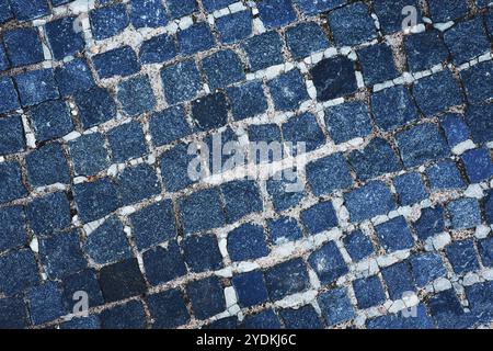Background Stone,Textured. Abstract background for design from paving stones. ..Old abandoned paving stones. Stock Photo