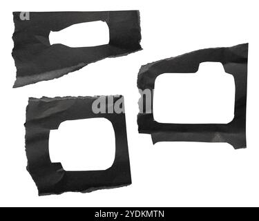 Torn black paper with abstract shape engrave on white background with clipping path Stock Photo