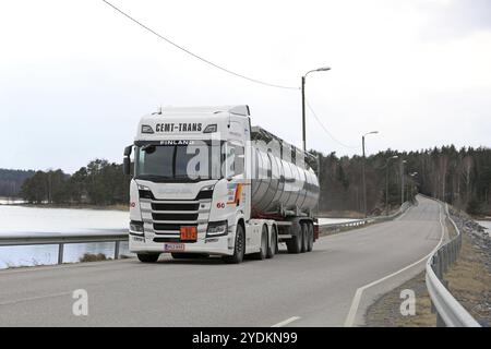 SALO, FINLAND, APRIL 14, 2017: White Next Generation Scania R500 semi tanker for ADR haul of Cemt-Trans moves along highway on a cloudy day of spring Stock Photo