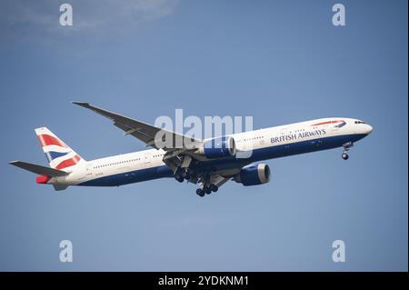 26.07.2023, Singapore, Republic of Singapore, Asia, A British Airways Boeing 777-300 ER passenger aircraft, registration G-STBL, on approach to Changi Stock Photo