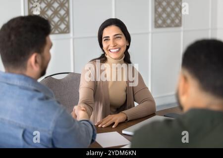 Happy successful Latin professional woman getting job Stock Photo