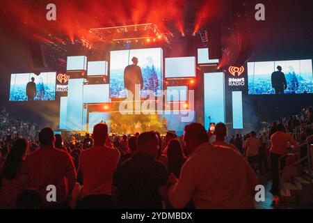 Miami, United States. 26th Oct, 2024. Music fans enjoy the spectacle of the iHeartRadio's Fiesta Latina 2024 at the Kaseya Center in Miami, Florida on Saturday, October 26, 2024 . Photo By Gary I Rothstein/UPI Credit: UPI/Alamy Live News Stock Photo