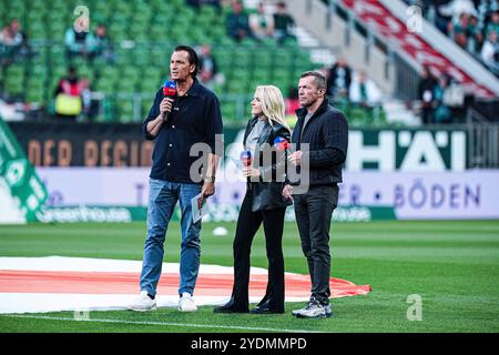 Sky-Moderator Sebastian Hellmann, Julia Simic, Lothar Matthaeus  GER, SV Werder Bremen vs. Bayer 04 Leverkusen, Fussball, Bundesliga, Spieltag 8, Spielzeit 2024/25, 26.10.2024  DFL REGULATIONS PROHIBIT ANY USE OF PHOTOGRAPHS AS IMAGE SEQUENCES AND/OR QUASI-VIDEO  Foto: Eibner-Pressefoto/Marcel von Fehrn Stock Photo