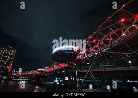 Singapore - August 14, 2024: Helix Bridge, Pedestrian bridge linking the Marina Centre with Marina South Stock Photo