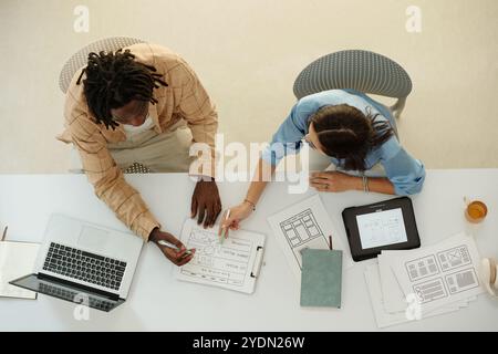 Collaborating on Design Project in Modern Office Stock Photo